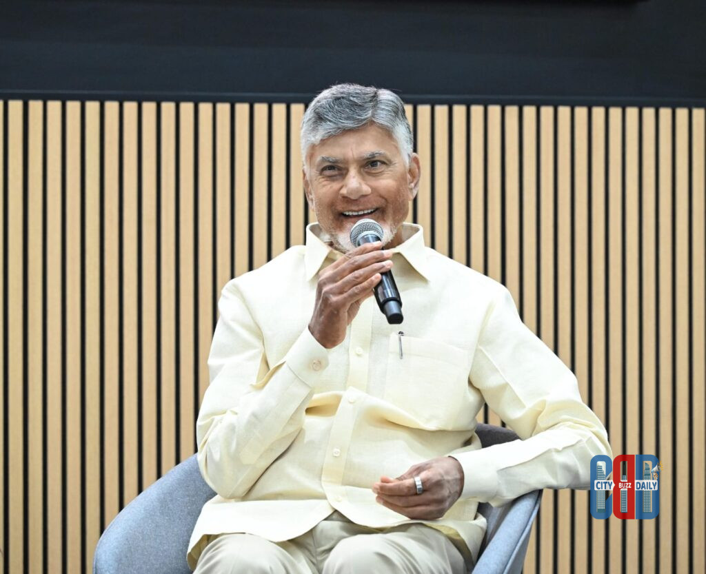 Chandrababu Naidu speaking at a summit event in Hyderabad discussing development initiatives