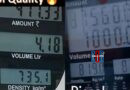 Fuel pump display showing petrol and diesel density readings at a petrol station