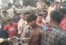 Police detain a suspected thief caught by locals at Maripeda vegetable market