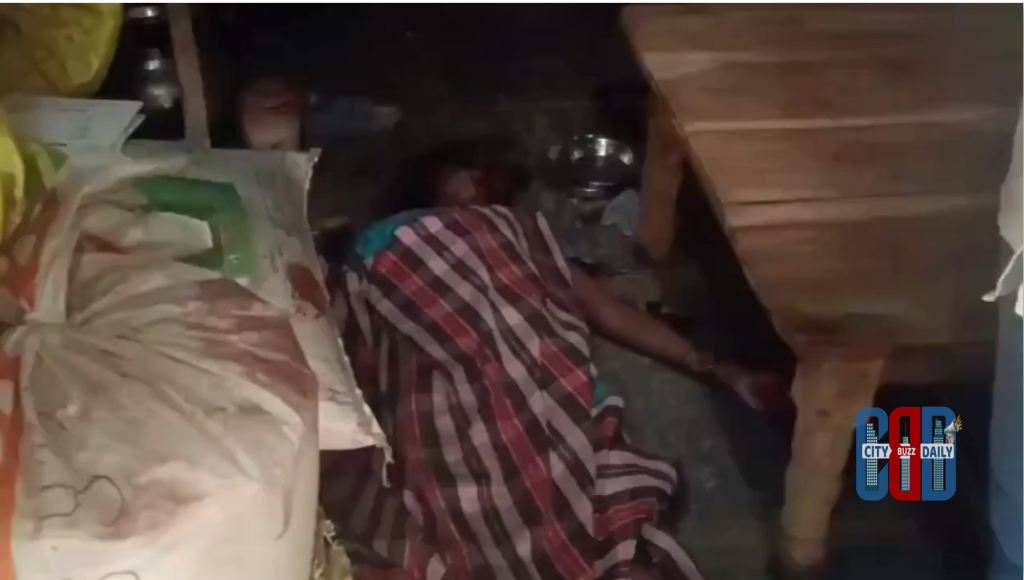 Police officials inspect the crime scene in Peddapur village of Mulugu district after wife murder case