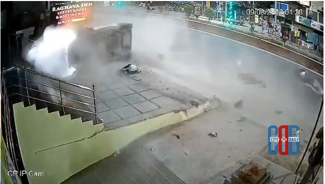 Car accident scene on the Nalgonda–Hyderabad highway where sanitation workers and a scooter rider were injured after being hit by a speeding vehicle.