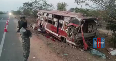 Overturned private travels bus after fatal road accident near Gannaram in Nizamabad district