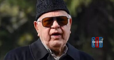 Security personnel protect Farooq Abdullah after firing incident at wedding ceremony